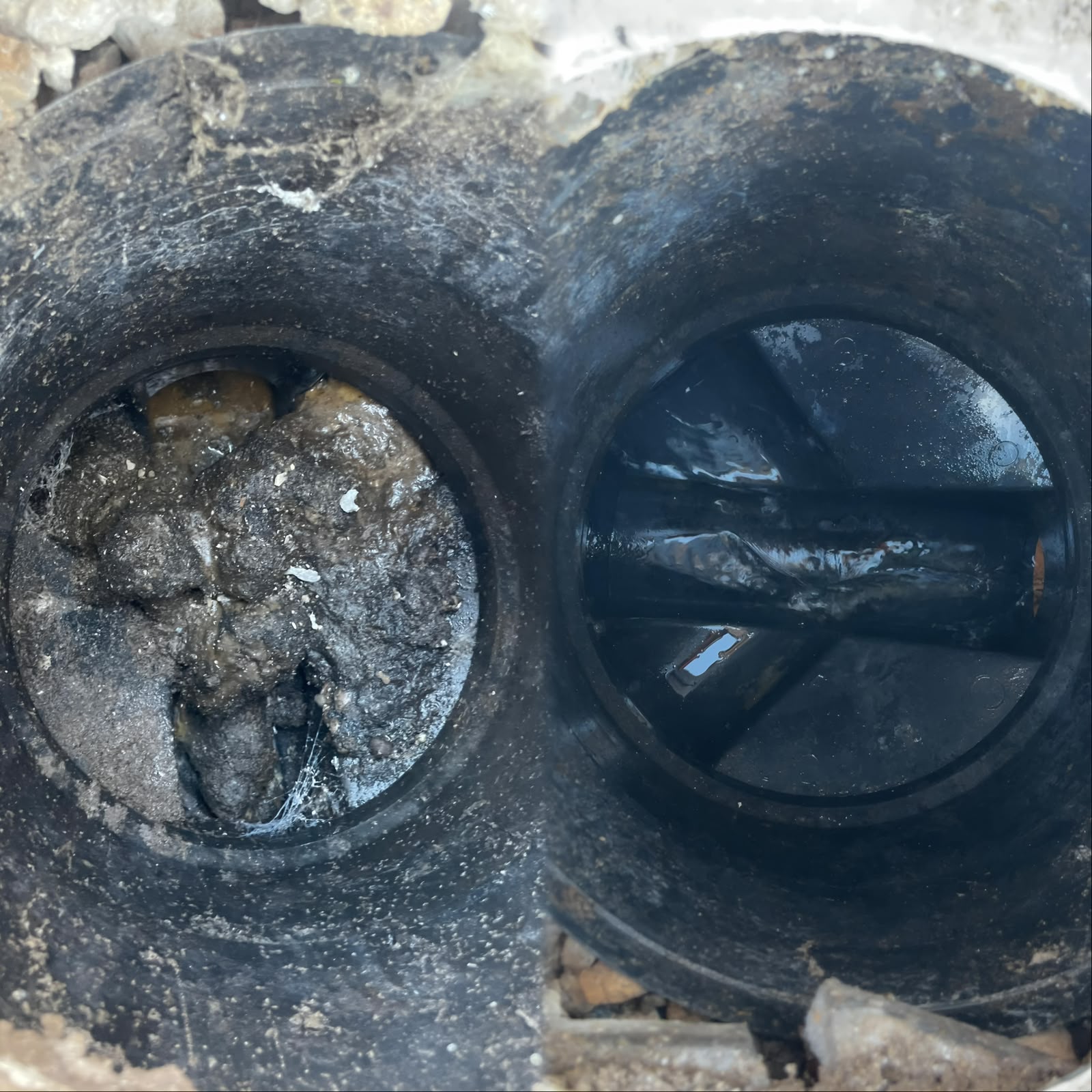 A blocked and unblocked manhole